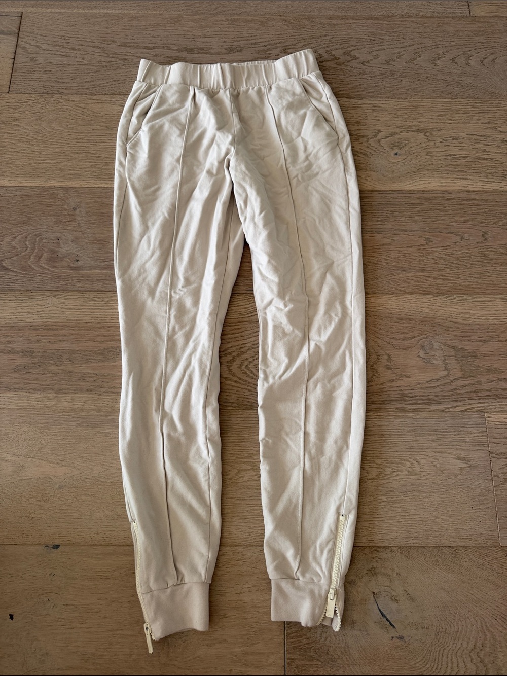 ALO Yoga Cream Track Joggers with Ankle Zips